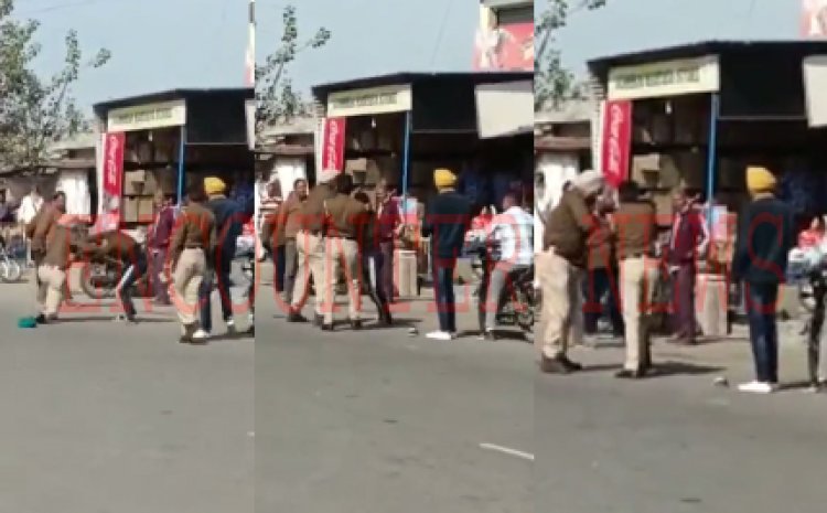 पंजाबः युवक और पुलिस कर्मी के बीच जमकर चले लात-घूंसे, देखें वीडियो